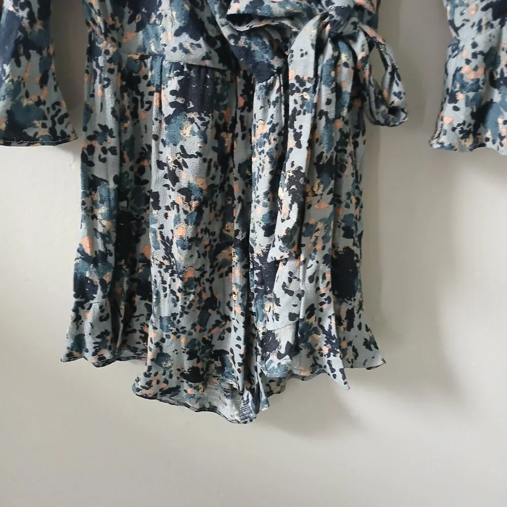 Free People Size S All the Right Ruffles Blue Floral Romper Flutter Sleeve Vneck